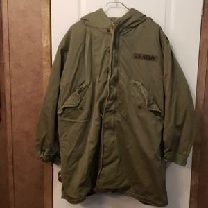 Army coat with button in liner.